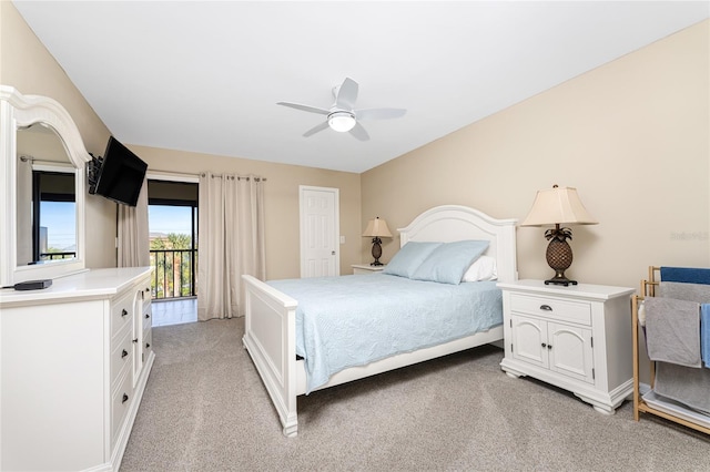 1551 Beach Rd Unit 412, Englewood, FL 34223 - bedroom featuring light colored carpet, access to outside, and a ceiling fan