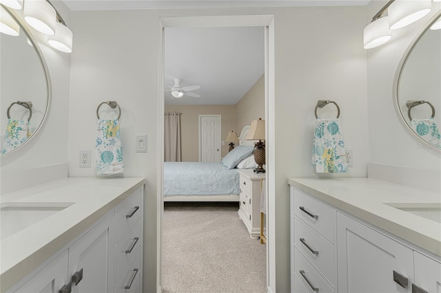 1551 Beach Rd Unit 412, Englewood, FL 34223 - ensuite bathroom featuring ceiling fan and two vanities