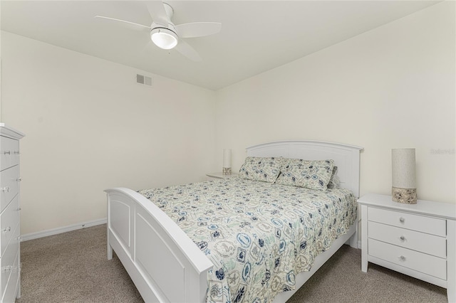 1551 Beach Rd Unit 412, Englewood, FL 34223 - bedroom with light colored carpet, ceiling fan, and baseboards