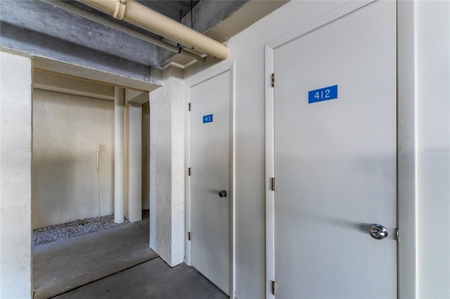 1551 Beach Rd Unit 412, Englewood, FL 34223 - hallway with concrete flooring