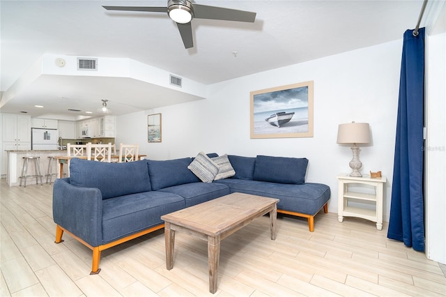 301 S Gulf Blvd Unit 419, Placida, FL 33946 - living area with light wood-style flooring, ceiling fan, and visible vents