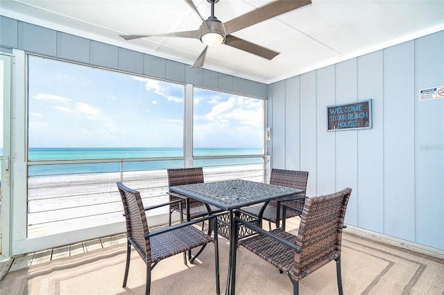 301 S Gulf Blvd Unit 419, Placida, FL 33946 - sunroom featuring a view of the beach and a water view