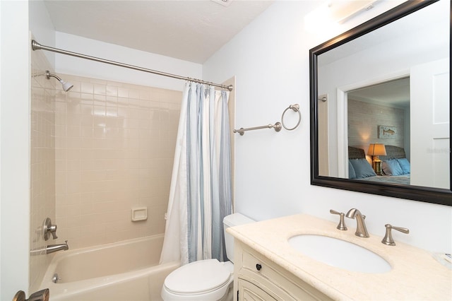 301 S Gulf Blvd Unit 419, Placida, FL 33946 - bathroom featuring shower / tub combo, toilet, vanity, and ensuite bathroom