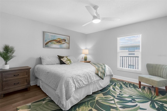 316 Coldeway Dr Unit 29, Punta Gorda, FL 33950 - bedroom featuring a ceiling fan, baseboards, and wood finished floors