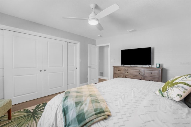 316 Coldeway Dr Unit 29, Punta Gorda, FL 33950 - bedroom featuring a ceiling fan, visible vents, a closet, and wood finished floors