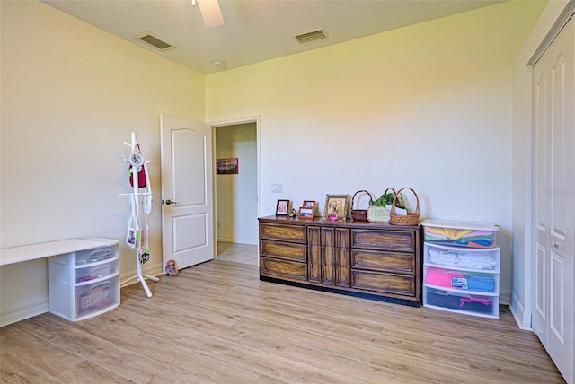 1078 Boundary Blvd, Rotonda West, FL 33947 - bedroom with wood finished floors, baseboards, and a ceiling fan