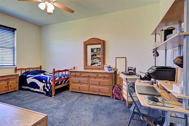 1078 Boundary Blvd, Rotonda West, FL 33947 - bedroom featuring dark colored carpet, a desk, and ceiling fan