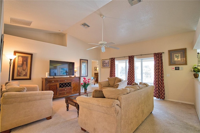 116 Albatross Rd, Rotonda West, FL 33947 - living room featuring light colored carpet, a ceiling fan, vaulted ceiling, and baseboards