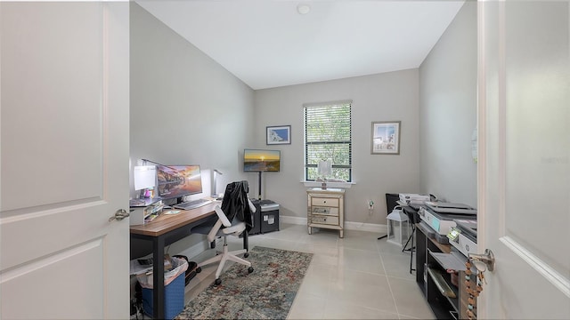 2117 Laurifolia Ct, North Port, FL 34289 - office area featuring baseboards and light tile patterned floors