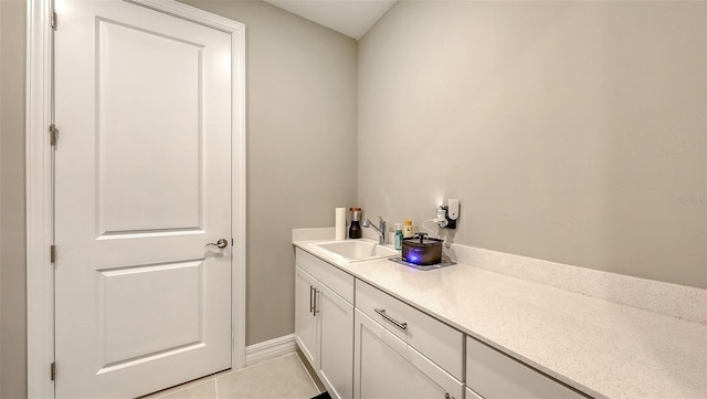 2117 Laurifolia Ct, North Port, FL 34289 - bathroom featuring tile patterned floors and vanity