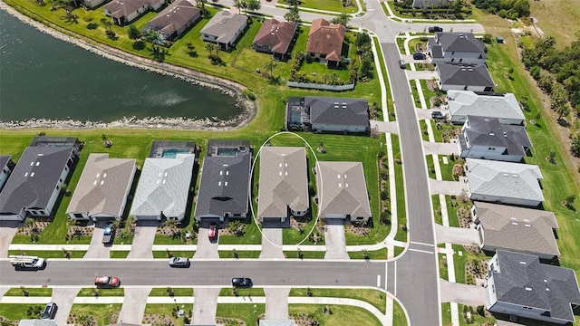 2117 Laurifolia Ct, North Port, FL 34289 - drone / aerial view featuring a water view and a residential view