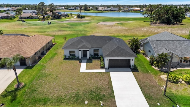 166 Bunker Rd, Rotonda West, FL 33947 - drone / aerial view featuring a residential view, a water view, and view of golf course