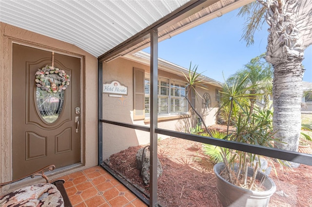 1670 Faust Dr, Englewood, FL 34224 - entrance to property featuring stucco siding
