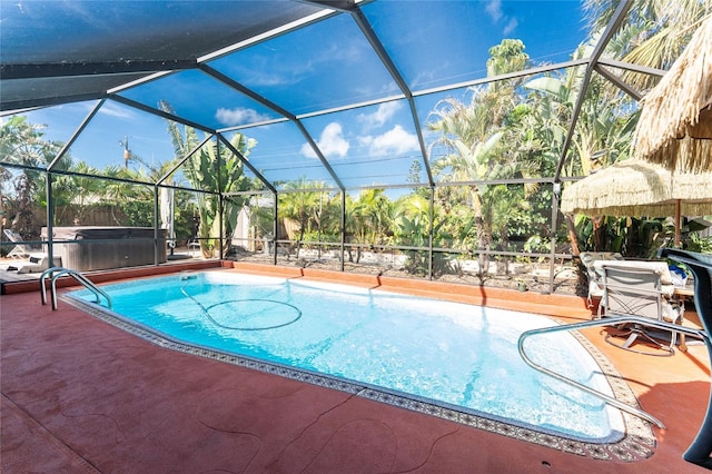 1670 Faust Dr, Englewood, FL 34224 - pool featuring a patio, a hot tub, and glass enclosure