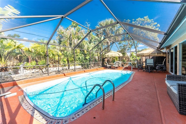 1670 Faust Dr, Englewood, FL 34224 - outdoor pool featuring a patio, outdoor dining area, and a lanai