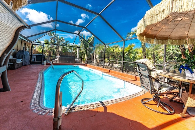 1670 Faust Dr, Englewood, FL 34224 - pool with area for grilling, a patio area, and glass enclosure