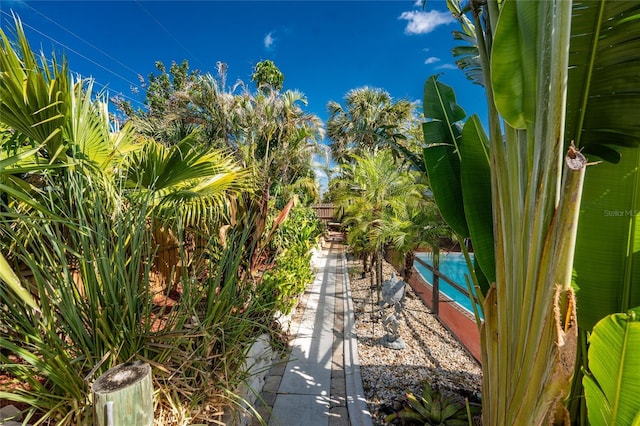1670 Faust Dr, Englewood, FL 34224 - view of patio / terrace with an outdoor pool and fence