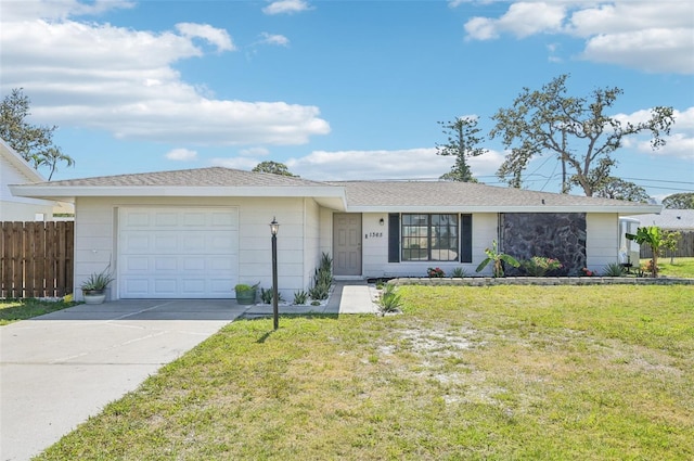 1365 Sussex Rd, Venice, FL 34293 - ranch-style home featuring a garage, a front yard, fence, and concrete driveway