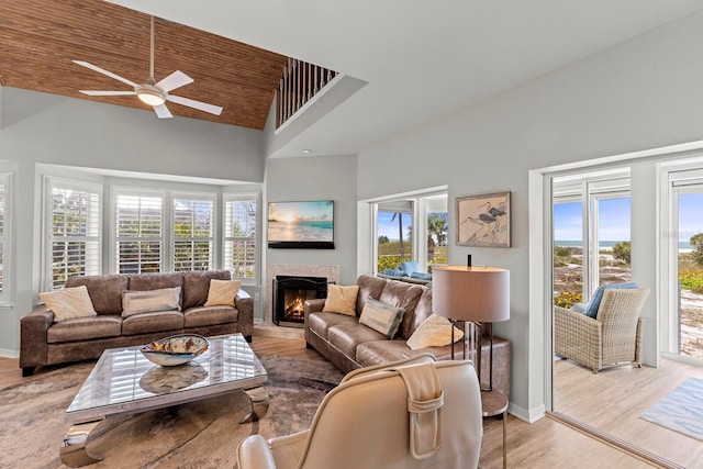 17 Seawatch Dr, Boca Grande, FL 33921 - living area featuring plenty of natural light, high vaulted ceiling, and ceiling fan