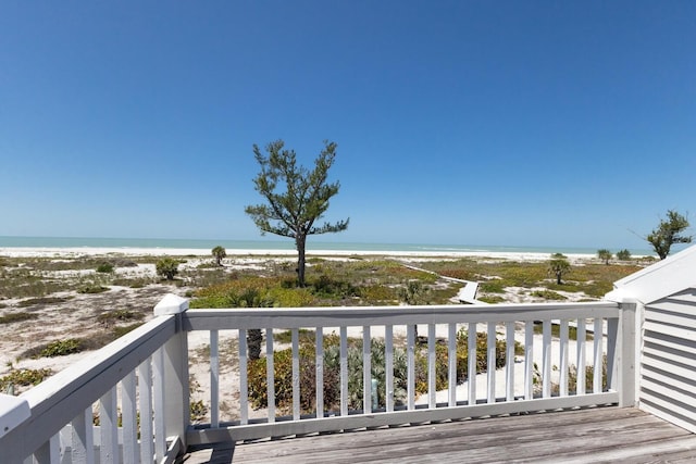 17 Seawatch Dr, Boca Grande, FL 33921 - wooden terrace with a view of the beach and a water view