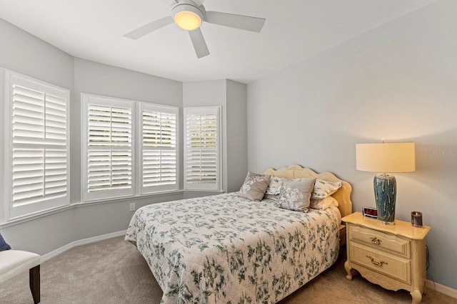 17 Seawatch Dr, Boca Grande, FL 33921 - bedroom featuring baseboards, a ceiling fan, and carpet