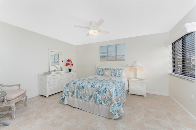 2955 N Beach Rd Unit D113, Englewood, FL 34223 - tiled bedroom with ceiling fan and baseboards