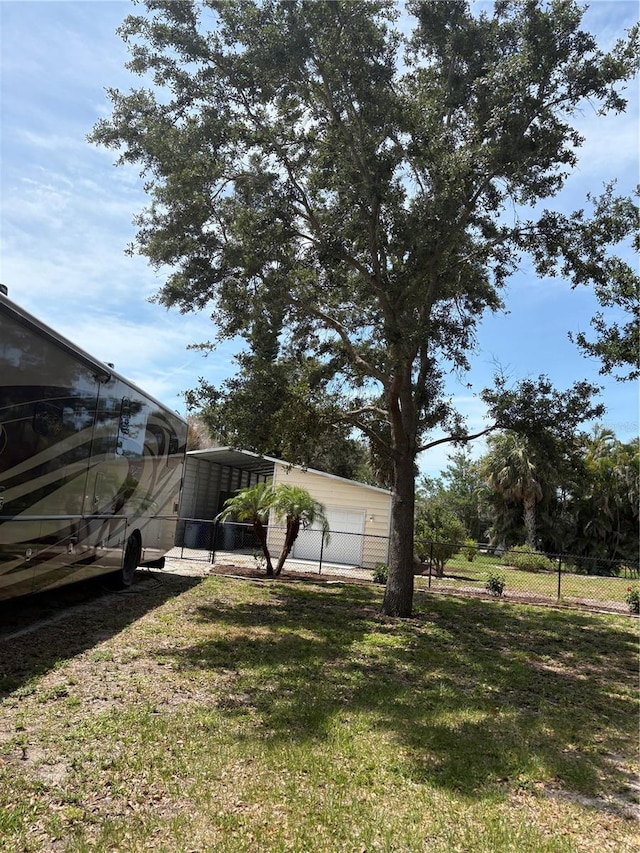 941 Elwood Ave, Englewood, FL 34223 - view of yard with a carport