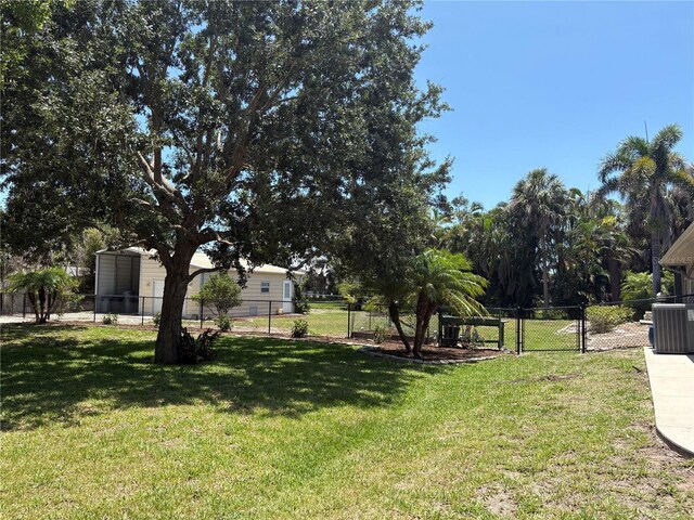 941 Elwood Ave, Englewood, FL 34223 - view of yard featuring a gate