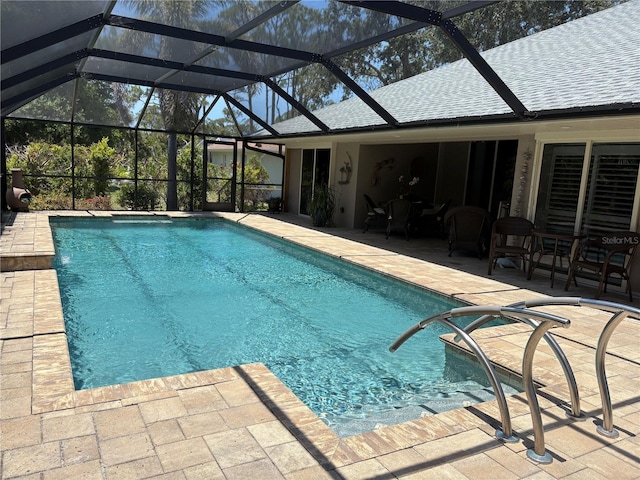 941 Elwood Ave, Englewood, FL 34223 - outdoor pool with a patio and glass enclosure