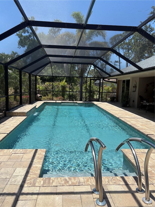 941 Elwood Ave, Englewood, FL 34223 - outdoor pool with a patio area and glass enclosure