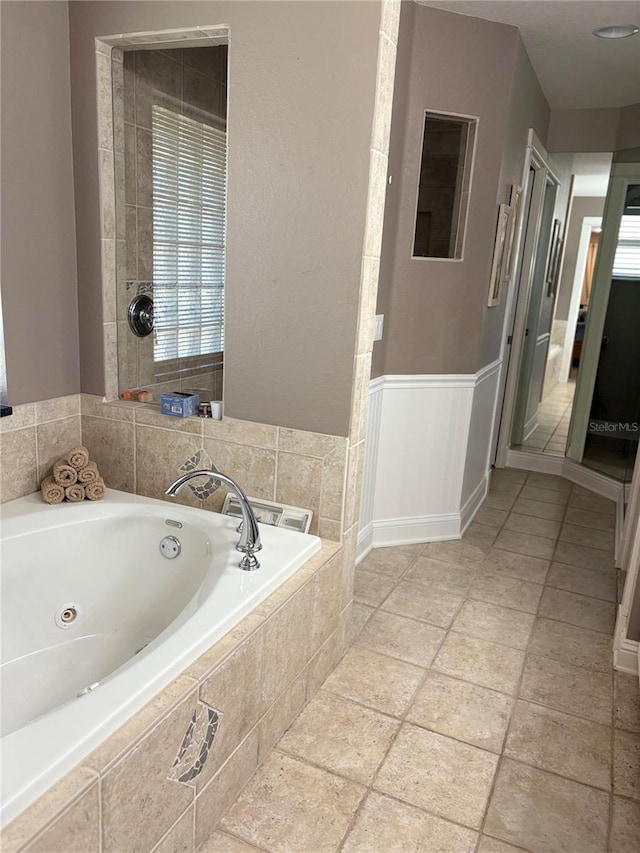 941 Elwood Ave, Englewood, FL 34223 - bathroom with a tub with jets