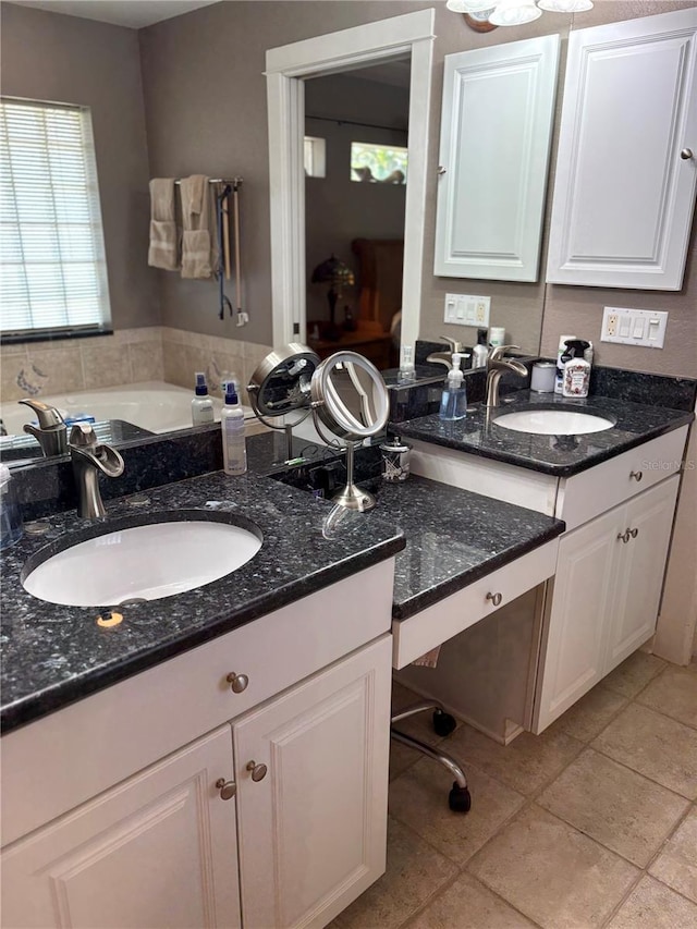 941 Elwood Ave, Englewood, FL 34223 - bathroom with vanity and a garden tub
