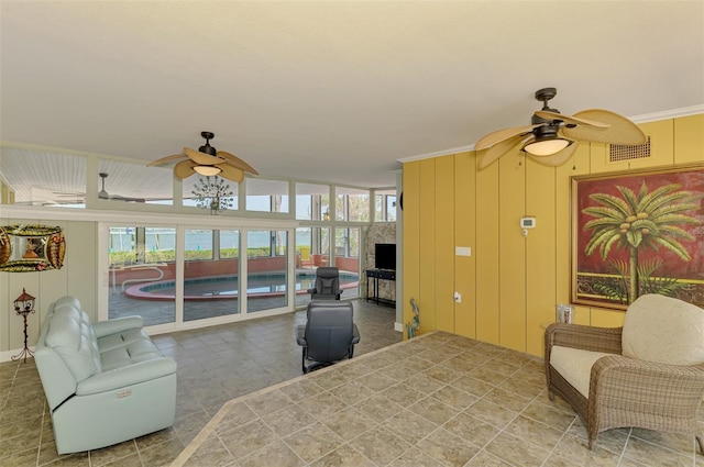 bedroom with a sunroom and crown molding