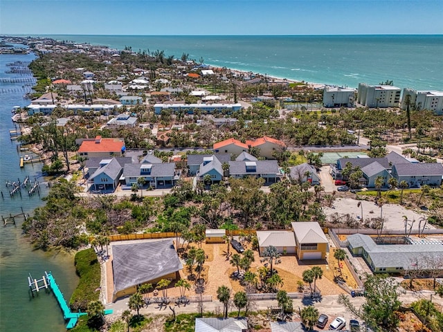 aerial view with a residential view and a water view