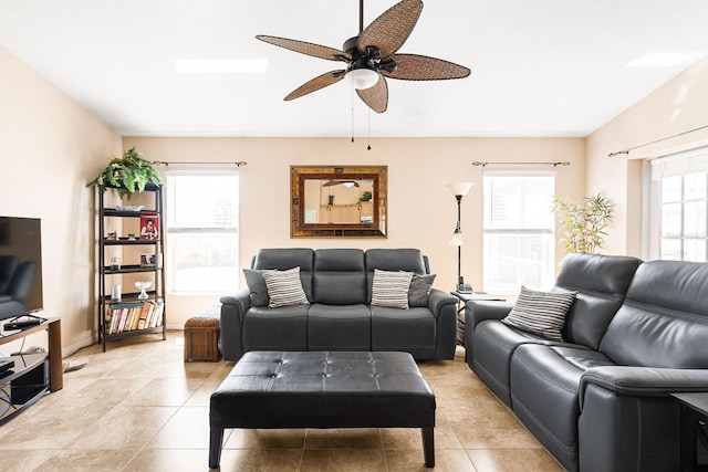 7089 Benson St, Englewood, FL 34224 - living room with a ceiling fan and light tile patterned floors