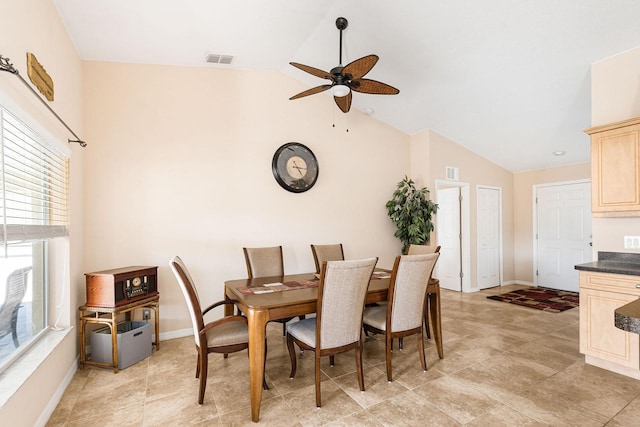 7089 Benson St, Englewood, FL 34224 - dining room featuring lofted ceiling, a ceiling fan, visible vents, and baseboards