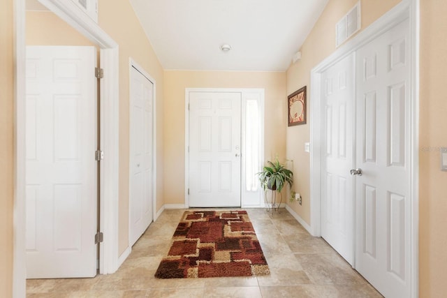 7089 Benson St, Englewood, FL 34224 - entrance foyer featuring visible vents, baseboards, and light tile patterned floors