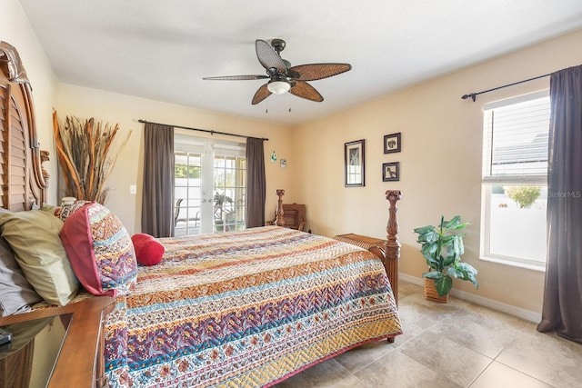 7089 Benson St, Englewood, FL 34224 - tiled bedroom featuring a ceiling fan, baseboards, and access to outside