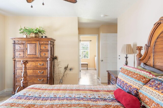 7089 Benson St, Englewood, FL 34224 - bedroom with ceiling fan, baseboards, and light tile patterned floors