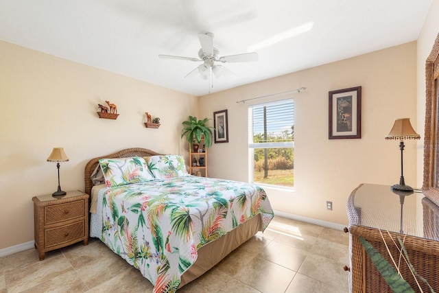 7089 Benson St, Englewood, FL 34224 - bedroom featuring a ceiling fan, baseboards, and light tile patterned floors