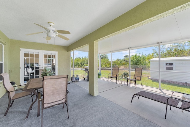 7089 Benson St, Englewood, FL 34224 - sunroom / solarium with outdoor dining area, ceiling fan, and french doors
