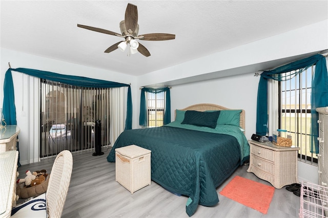 23347 Lehigh Ave, Port Charlotte, FL 33954 - bedroom featuring a ceiling fan and wood finished floors