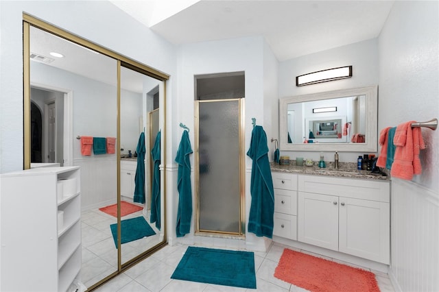 23347 Lehigh Ave, Port Charlotte, FL 33954 - bathroom with visible vents, vanity, and a stall shower