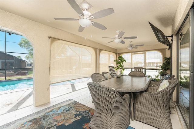 23347 Lehigh Ave, Port Charlotte, FL 33954 - sunroom with ceiling fan and outdoor dining area