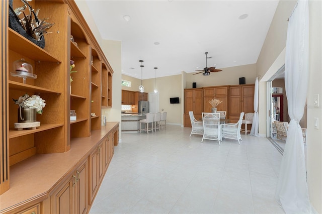 26 Saint Croix Way, Englewood, FL 34223 - dining area with ceiling fan, baseboards, and light tile patterned floors
