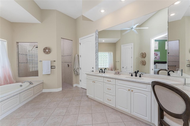 26 Saint Croix Way, Englewood, FL 34223 - bathroom featuring a bath, a sink, double vanity, a ceiling fan, and a walk in shower