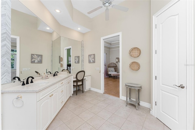 26 Saint Croix Way, Englewood, FL 34223 - bathroom with tile patterned floors, a sink, baseboards, recessed lighting, and a ceiling fan