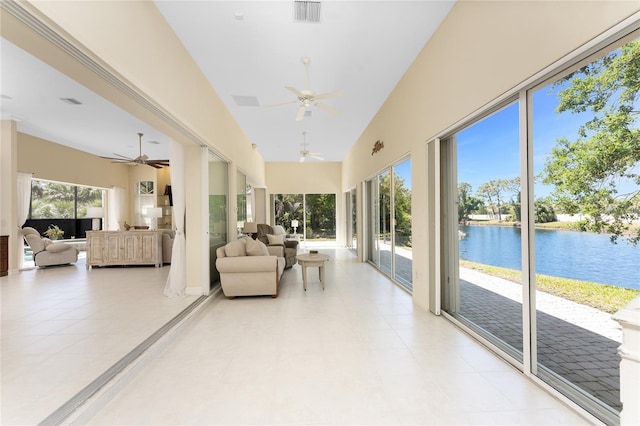 26 Saint Croix Way, Englewood, FL 34223 - sunroom with visible vents, a towering ceiling, and a water view