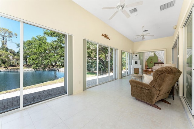 26 Saint Croix Way, Englewood, FL 34223 - sunroom featuring visible vents, tile patterned floors, high vaulted ceiling, and a water view