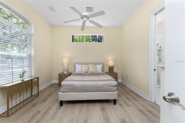 26 Saint Croix Way, Englewood, FL 34223 - bedroom featuring baseboards, visible vents, multiple windows, and light wood finished floors